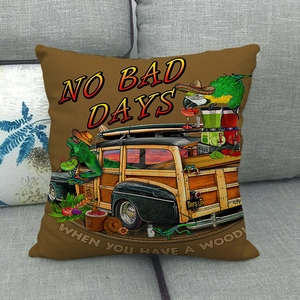 Macro detail of linen pillowcase featuring vintage woodie wagon and surfing theme