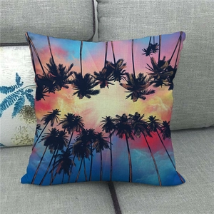Watercolor linen throw pillow cover featuring a tropical palm tree sunset silhouette design