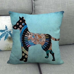 Close-up of bohemian linen pillow cover with dog silhouette and colorful patterns