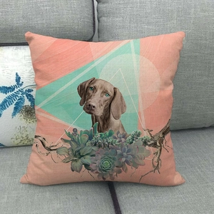 Linen pillow cover featuring a floral watercolor dog print on a modern grey sofa