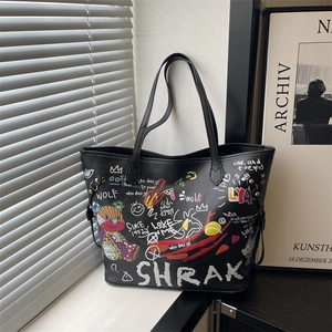 Graffiti bucket bag featuring cartoon bear patterns and street art style leather finish