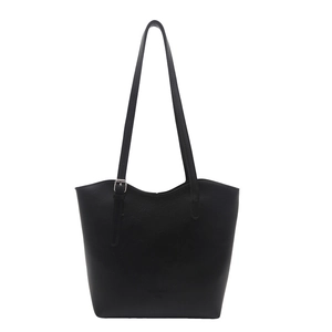 Classic black leather tote bag with pebble texture and adjustable shoulder strap for women