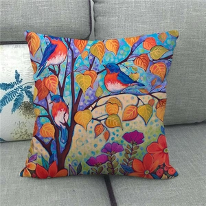 Detail of artistic watercolor birds and autumn leaves on linen throw pillow cover