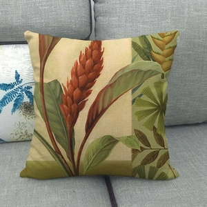 Square linen throw pillow case featuring tropical palm leaves and red ginger flower prints