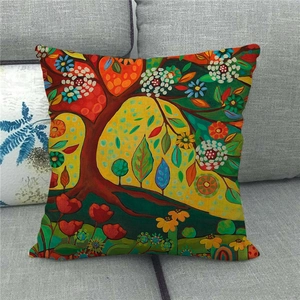 Detailed texture of linen throw pillow case featuring colorful watercolor tree artwork