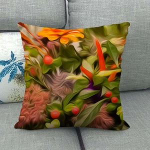 Detailed close-up of watercolor floral linen pillow cover on a grey sofa