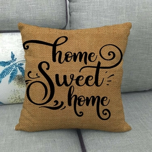 Close-up of the linen fabric texture and black Home Sweet Home print on the cushion cover