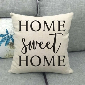 Detail showing Sweet Home slogan print on high-quality beige linen pillowcase texture