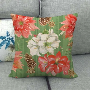 Housse de coussin de Noël en lin avec fleurs rouges et pommes de pin sur fond vert