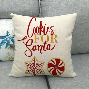 Close-up of linen Christmas pillowcase with red and gold Cookies FOR Santa print