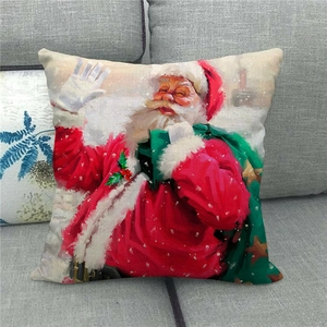Detail of Christmas linen pillowcase featuring classic Santa Claus design on a grey sofa