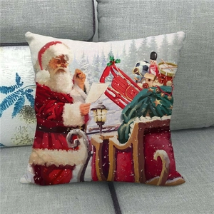 Linen Christmas pillow cover featuring oil painting style Santa Claus on a gray sofa