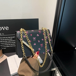 Floral crossbody bag with pink cherry prints and gold chain strap for women
