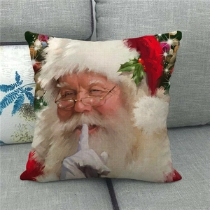 Detail of Christmas linen pillowcase featuring artistic Santa Claus oil painting print