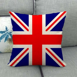 Detail of linen Union Jack pillowcase with rustic texture on a grey fabric sofa