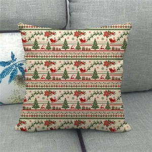 Weihnachtskissenbezug aus Leinen mit Rentier-Motiv auf einem grauen Sofa-Kissen