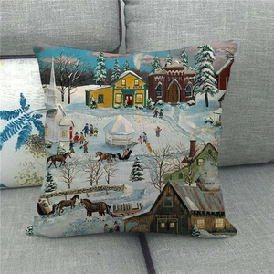 Detailed texture of linen pillowcase featuring a snowy winter village oil painting print