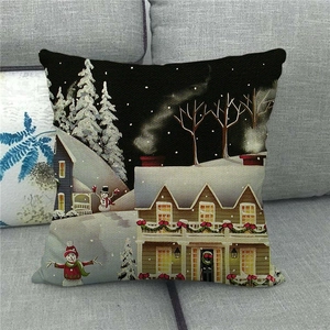 Detail of Christmas pillowcase with festive snow scene illustration and linen texture
