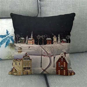 Detail of Christmas pillowcase showing a snowy village night scene and Merry Christmas text