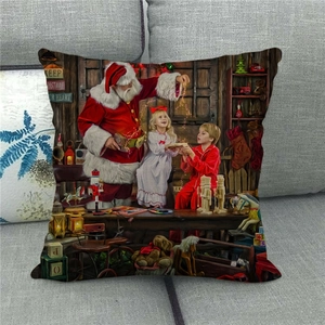 Detail of Christmas linen pillowcase showing Santa Claus with kids and festive text