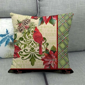 Detailed texture of Christmas linen pillow case featuring red cardinal and pine cones
