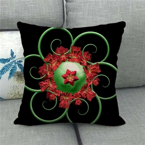 Detail of Christmas pillow cover featuring 3D red flower and green spiral pattern on linen