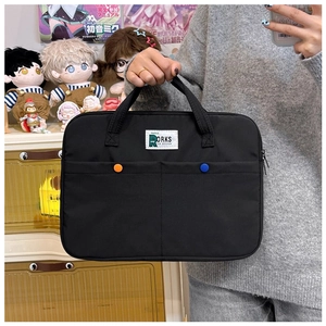 Détail du sac à main pour ordinateur 14 pouces en nylon noir avec poches et boucles colorées