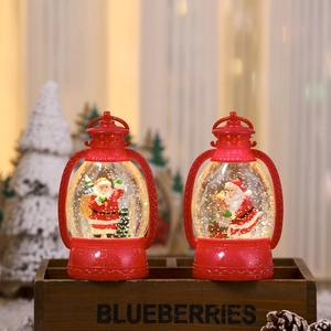 Luminous Christmas lantern with Santa figures and swirling snow glitter decoration