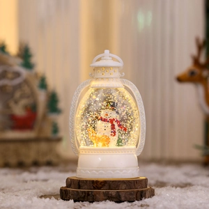 Close-up of a white vintage Christmas lantern with snowman and LED glitter snow
