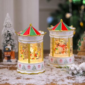 Detailed view of musical Christmas carousel water globe with rotating glitter and Santa