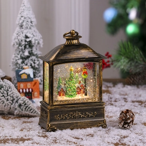 Macro shot of vintage bronze Christmas lantern featuring snow scenes and warm lighting