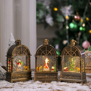 Vintage Christmas lantern set with LED lights rotating snow scene and bronze finish