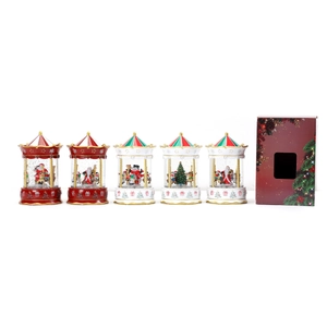Christmas carousel snow globes with music and lights in festive red gift packaging set