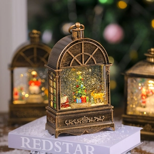 Vintage Christmas lantern with musical glowing snow globe and golden reindeer inside
