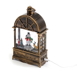 Detail of vintage Christmas snow globe lantern with reindeer scenes and USB power cable