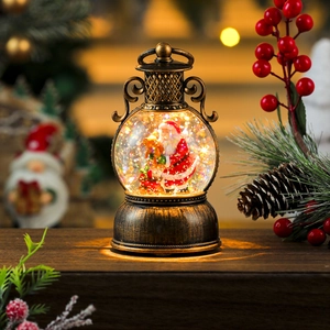Close-up of vintage bronze Christmas lantern featuring Santa figure and swirling sparkles