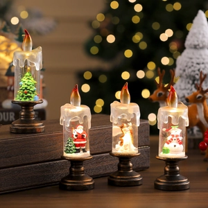 Christmas LED candle lantern set with Santa Snowman and Angel in warm glowing liquid