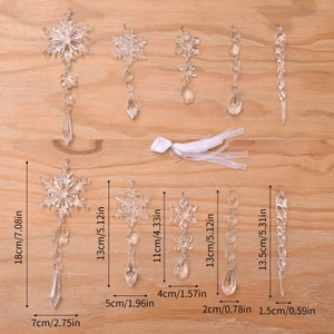 Macro detail of transparent Christmas icicle and snowflake ornaments with size measurements