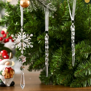 10-piece transparent icicle and snowflake ornaments hanging on a Christmas tree branch
