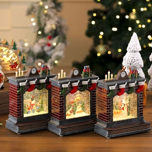 Three vintage Christmas fireplace music boxes with LED glowing snow globes and Santa scenery