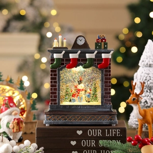 Christmas fireplace music box with snowman and glittering snow scene for festive decor