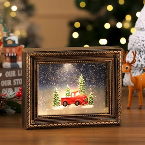 Vue détaillée du cadre de Noël vintage avec scène 3D lumineuse et effet de neige