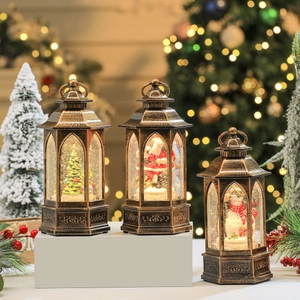 Vintage bronze Christmas lantern music box with swirling snow and festive LED light