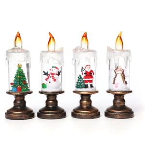 Set of four Christmas candle lamps with snowman and Santa figures on bronze bases