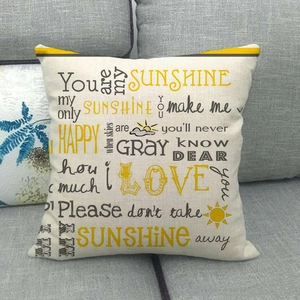 Close-up of linen fabric texture on You are my sunshine decorative pillowcase