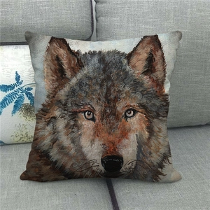 Detail of linen cushion cover showing woven texture and realistic wolf head art print