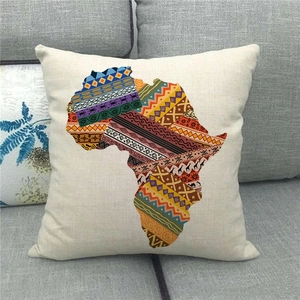 Detail of linen pillowcase featuring a colorful watercolor African map on a sofa