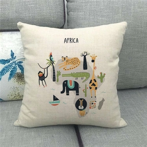 Close-up of linen pillowcase with watercolor cartoon animals on Africa map design