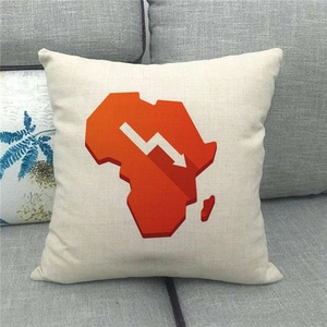Close-up of linen pillow cover featuring a gradient African map with a trend line icon