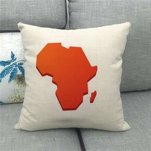 Close-up of linen cushion cover showing texture and orange African map print